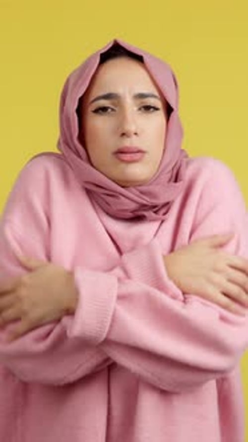 Muslim Woman Looking at Camera in the Cold