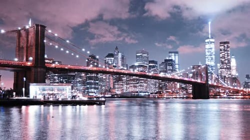 Manhattan Skyline And Brooklyn Bridge At Night, Time Lapse