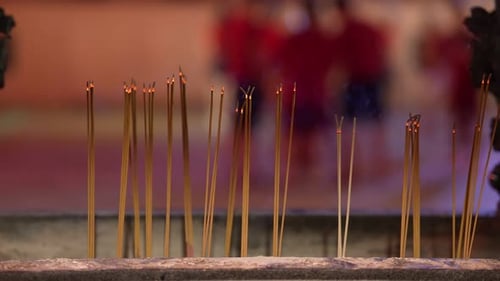 Burning incense sticks in a temple, close up