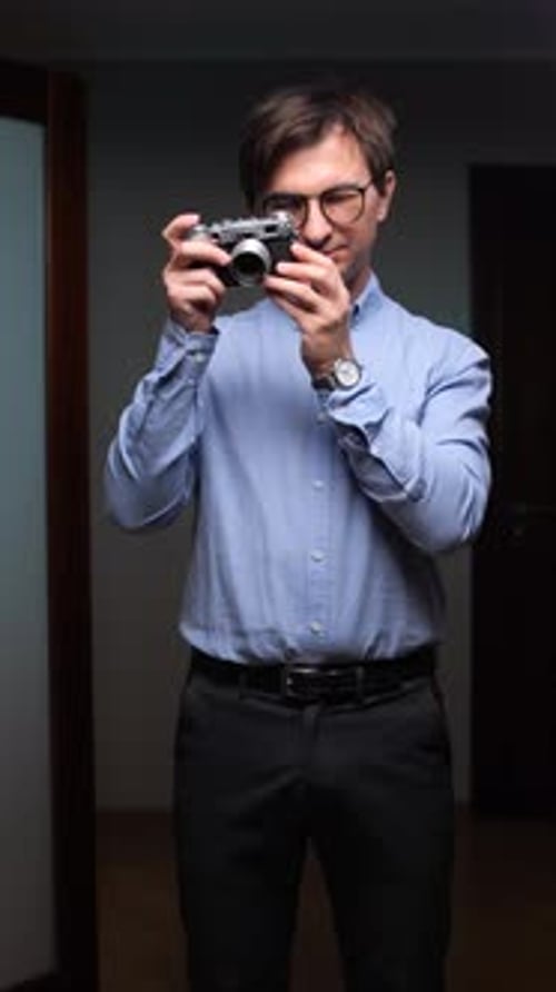 Vertical Video Photographer Taking Photo with Vintage Rangefinder Camera