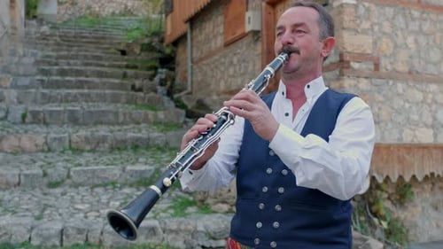 Man Musician Plays the Clarinet, Traditional