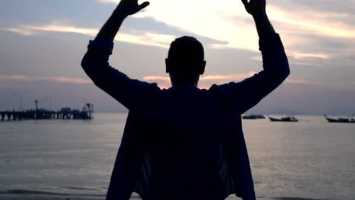 Man Stretching Arms and Admire Sunset on Beach, Super 240