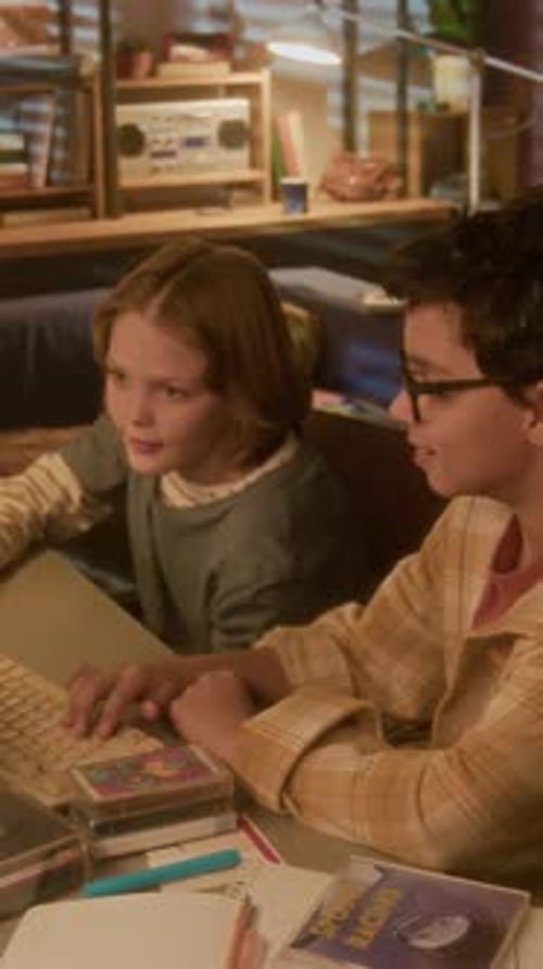 Boy and Teen Using Old Computer