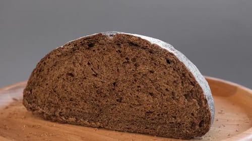 Baked Bread Loaf of Bread Fresh Bakery Products on Wooden Board Healthy Food Concept Top View Slices
