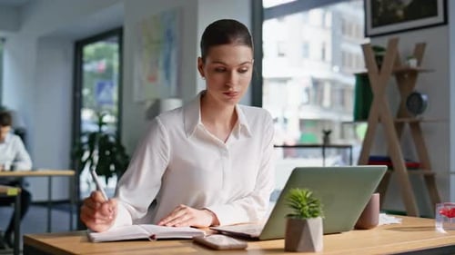 Creative Woman Working Project Writing Ideas at Notebook Sitting Office Closeup