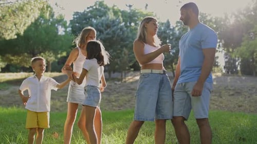 Family Having Fun Together in a Park