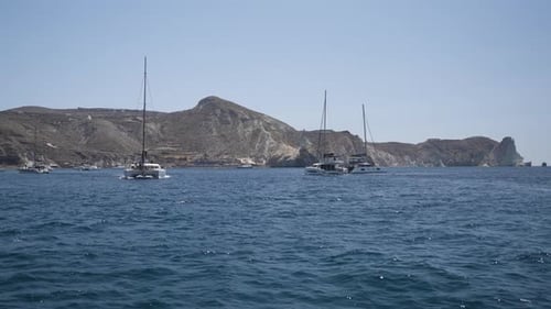 Sailboats and Yachts Sailing on the Ocean