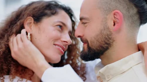 Happy Couple Embraces Tenderly in Close Up Portrait