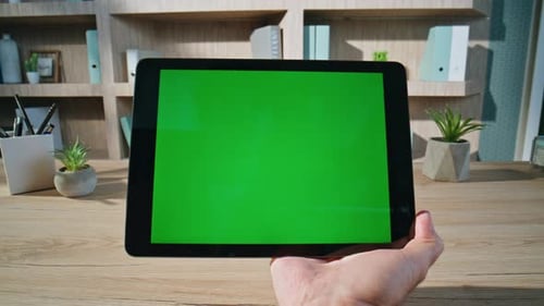 Customer Shopping Online Green Screen Tablet on Remote Workplace Closeup