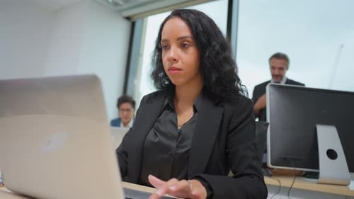 Latino young beautiful businesswoman working in the office workplace.