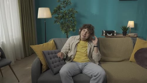 Man Listening to Music and Moving Hands