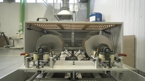 Large Rotating Rollers Create Rope Shape of Cardboard Surface