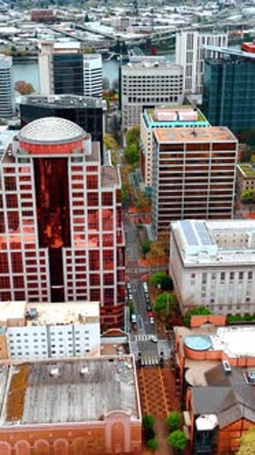 American Portland modern city aerial view. Drone shot of urban landscapes. Vertical video