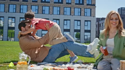 Cheerful Parents Son Fun Together Park Closeup Smiling Boy Playing with Father