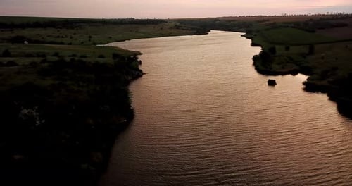 Evening Landscape Of A River At Sunset.