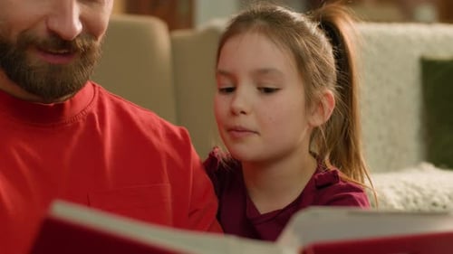 Caucasian Family Read Book Together at Evening Home Smiling Man Parent Dad Babysitter Father Help