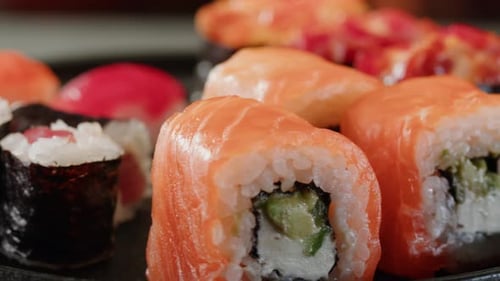 Sushi Sashimi Nigiri Platter Japanese Gunkan Maki Sushi Restaurant Fresh Tuna and Salmon Slices in