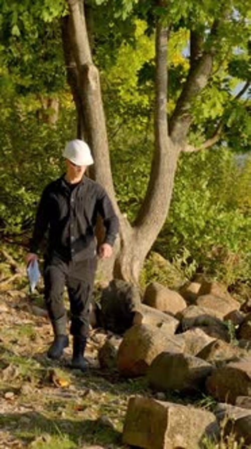 Environmental worker testing water quality in a natural area