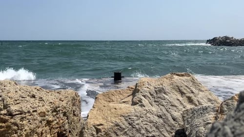 Stones on the Beach Sea Waves Beat Against the Rocks on the Shore Beautiful Sea View Waves of the