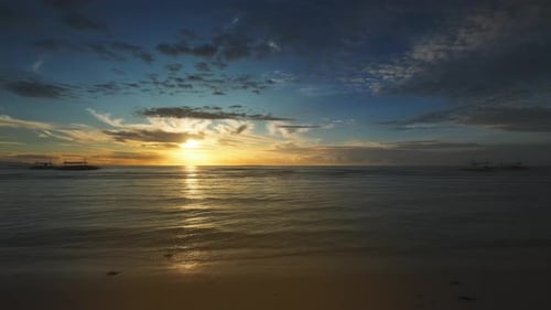 Sunrise Over Sea with Clouds and Waves Beach Scene