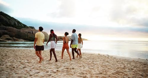 Beach, back view and friends walking on vacation, adventure and bonding together on tropical island