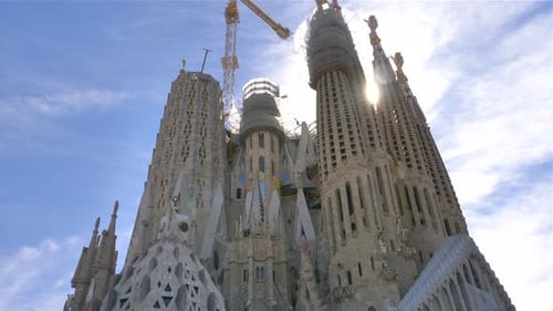 Sagrada Familia church, Barcelona, Spain with sun flare on a beautiful sunny day