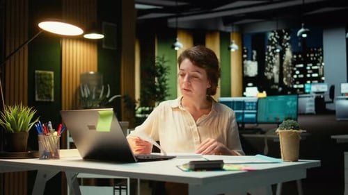 Tired woman office worker massages her neck