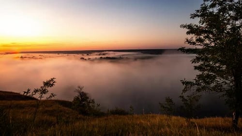 Sunrise Over Foggy Valley at Golden Hour