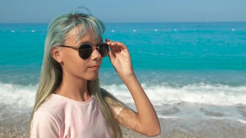 Surprised Teen Face By Sea
