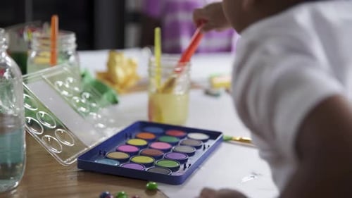 Toddler Boy Painting at Table 1823 Months