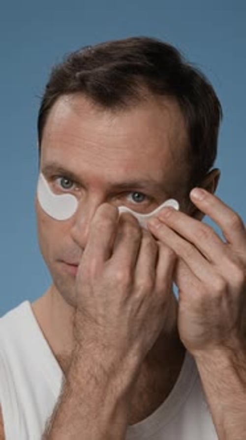 Man Using Eye Patches