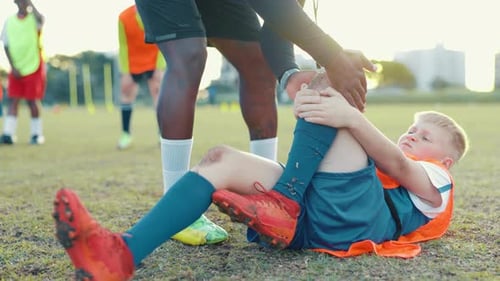 Soccer field, coach and kid with knee pain for injury, bone dislocation