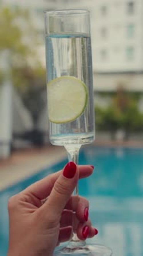 Refreshing Drink by the Tropical Pool on Vacation