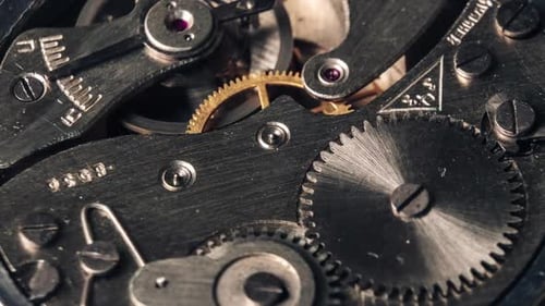 Timelapse of Mechanism of Vintage Stopwatch with Rotation CloseUp