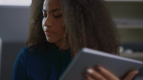 African American Woman Ceo Working Using Digital Tablet in Modern Office. Portrait