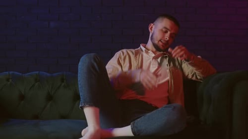 Man On Couch Playing Video Games