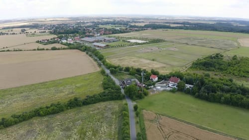 Aerial View From a Drone Colorful Houses in a Rural Area on a Sunny Day Drone Drifts to the Left