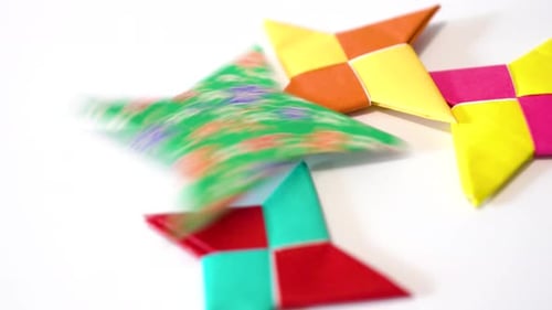 Colorful Origami Ninja Stars, Playful Artistic Design