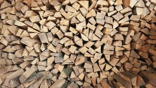 Pile of Chopped Fire Wood Prepared for Winter Dolly Motion