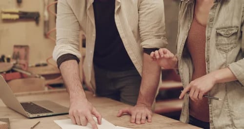 4k video footage of two young carpenters working in their woodworking workshop