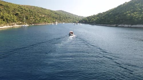Aerial View Of Tourist Boat Sailing Towards Stoncica Beach In Vis Island, Croatia.