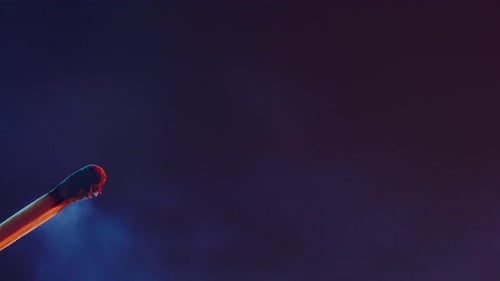 A Burning Match Goes Out and Leaves White Smoke