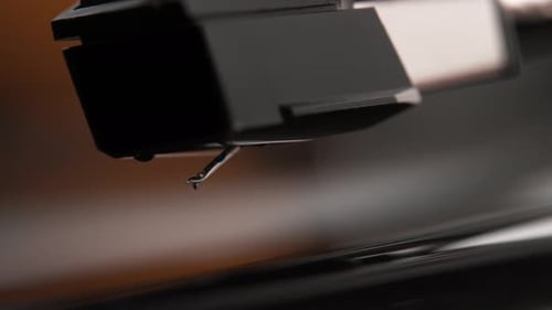 Record Player Needle on Spinning Vinyl Record