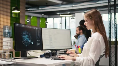 Female Technician Using AI LLM Chatbot to Automate Tasks in Office