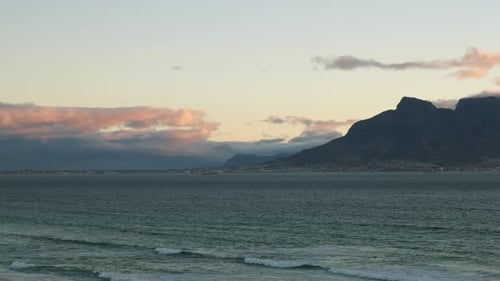 Picturesque View Of Table Mountain During Sunset In Cape Town, South Africa. Aerial Sideways Shot