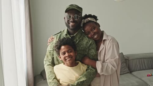 Happy Military Family Smiling Together at Home