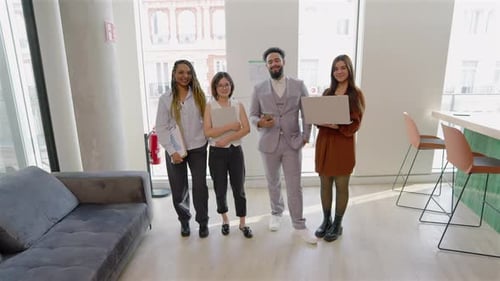 Diverse Professionals are Collaborating Effectively Within a Modern Office Space Environment