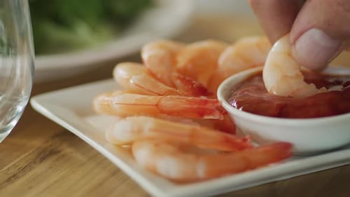 Close up of shrimp and cocktail sauce