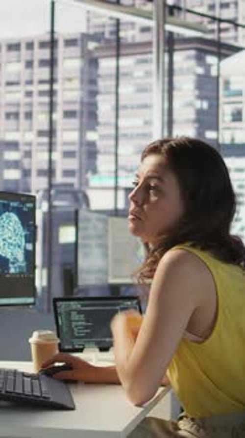 Vertical Video Admin and Coworker Conducting Experiments and Tests to Optimize AI