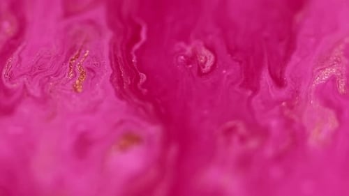 Abstract Pink Liquid with Gold Glittering Particles